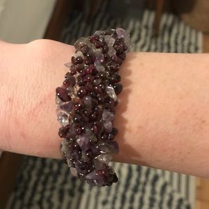NWOT. Hand-beaded purple bracelet